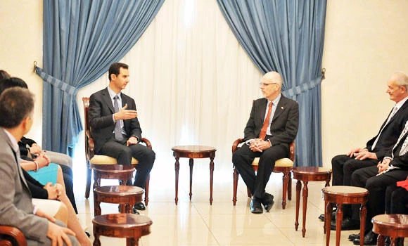 Assad regime and rebels reach landmark truce in besieged town