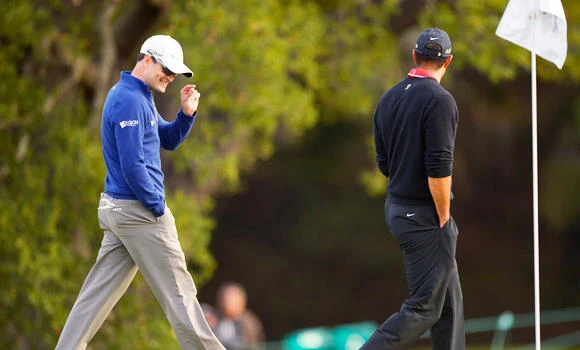 Johnson rallies to beat Woods in World Challenge