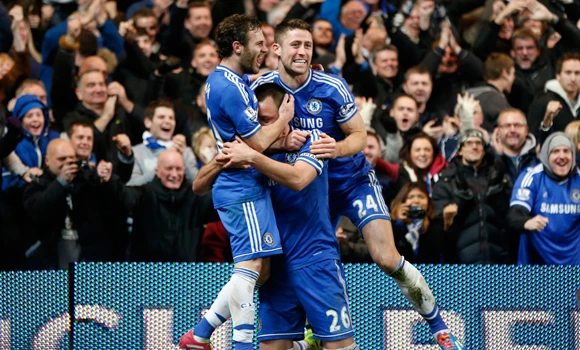 Chelsea, Man City breathe down Arsenal's neck