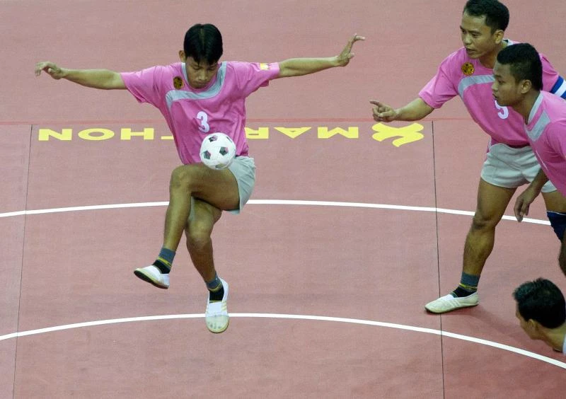 Obscure ball game brings hosts medal glory
