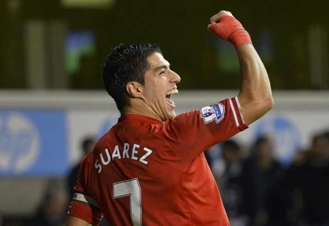 Suarez signs new contract at Liverpool