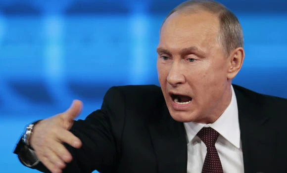Putin vows to wipe out 'terrorists' after suicide bombings