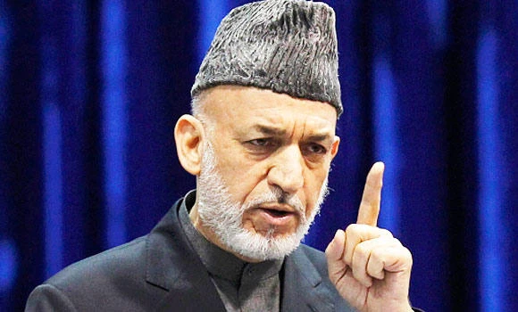 Hamid Karzai condemns killing of boy by US troops