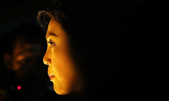 Thai PM calls for peaceful end to political crisis