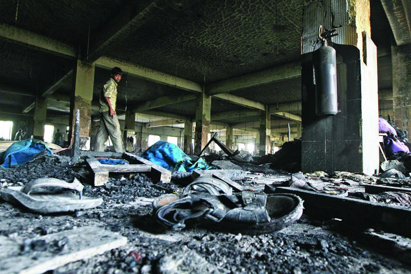 Dhaka court orders arrest of owners for deadly factory fire