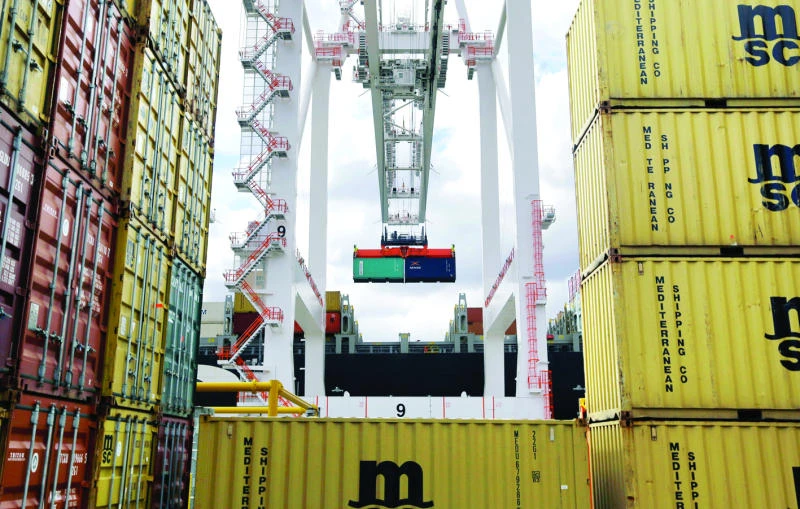 US trade gap shrinks to 4-year low on record exports