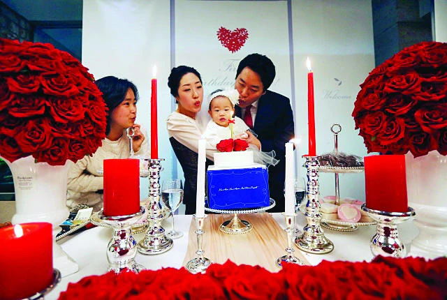 At one year, South Korean babies get gilded parties