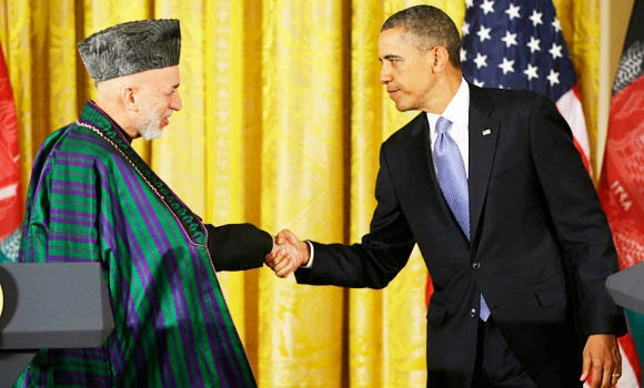 Karzai accuses US of killing 7 children in airstrike