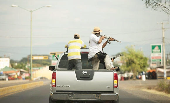 Mexican vigilantes seize new town from drug cartel