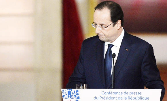 Hollande says going through painful times refuses
