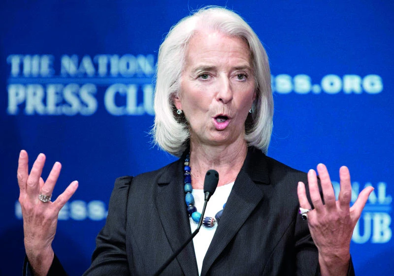 IMF sees global growth, deflation risks rising