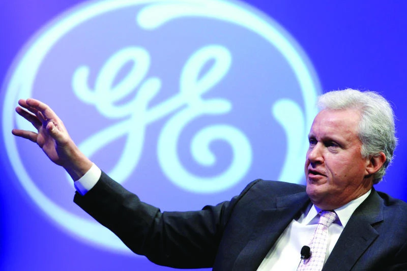GE profits rise 5% in improving economy