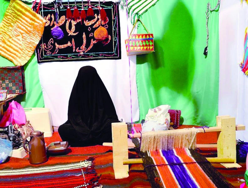 Blind weaver supports family with Sadu craft