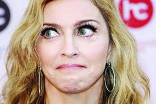 Madonna apologizes for racial slur