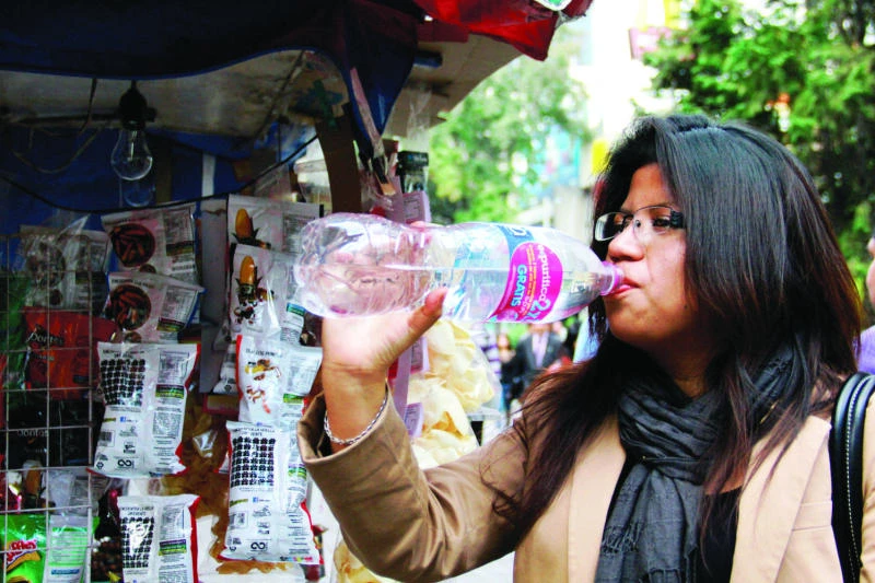 Mexico City bets on tap water law to change habit