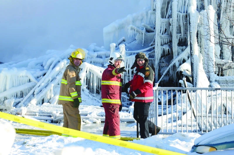 Quebec fire search hampered by cold