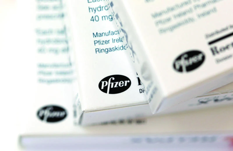 Pfizer profits fall, but beat expectations