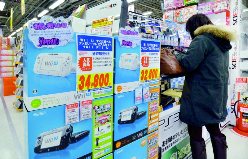 Nintendo boss to cut pay in half after profit dive