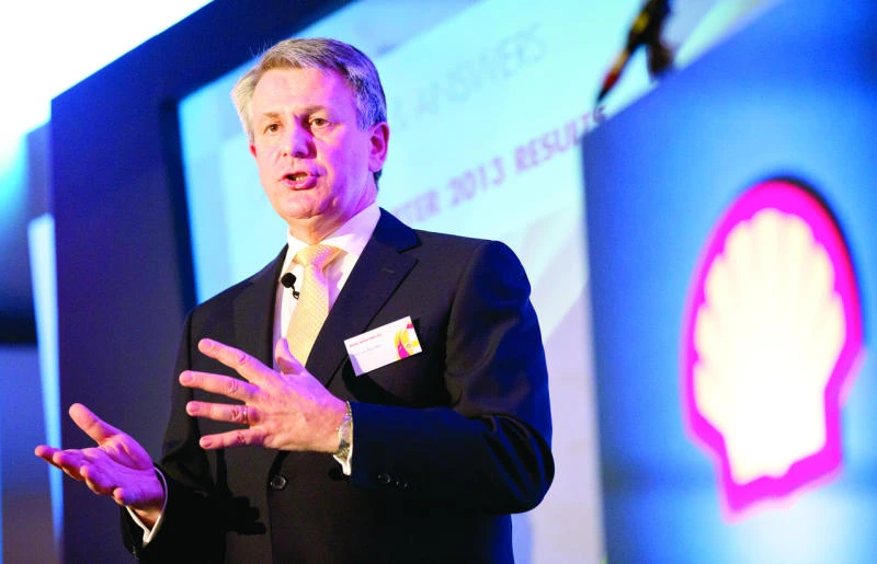 Shell to cut spending, sell assets after profit warning