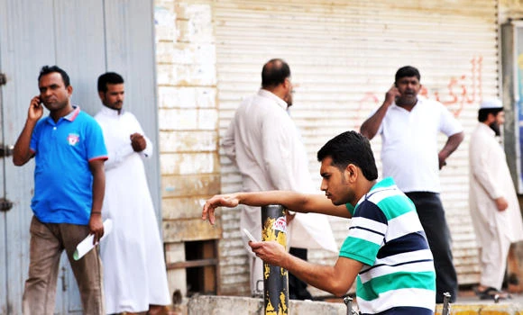 Labor crackdown, Haj limits ring in trouble for mobile operators