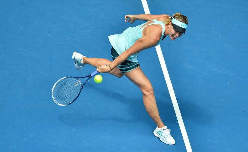 Fit Federer, rusty Sharapova into second week