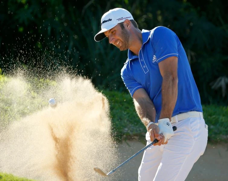 Johnson shares Champions lead
