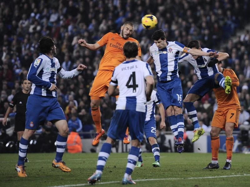 Real edges Espanyol to close on La Liga leaders