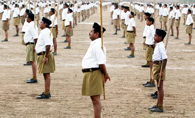 Volunteers of the Hindu radical organisation Rashtriya Swayamsevak Sangh (RSS) take part in a drill on the last day of their three-day workers' meeting in the western Indian city of Ahmedabad, in this file photo taken on January 4, 2015. (REUTERS)