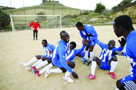 African asylum seekers in Sicily dream of soccer glory