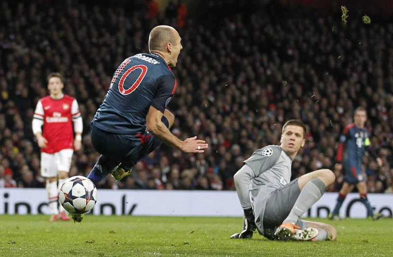 Wenger slams cynical Bayern as Arsenal face exit