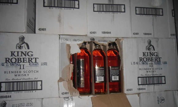 Customs inspector caught smuggling liquor