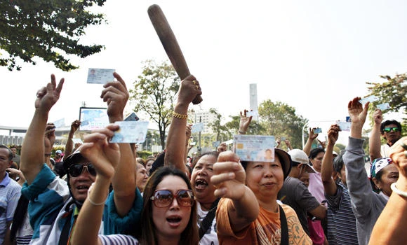 Rowdy protesters disrupt voting in Thai elections