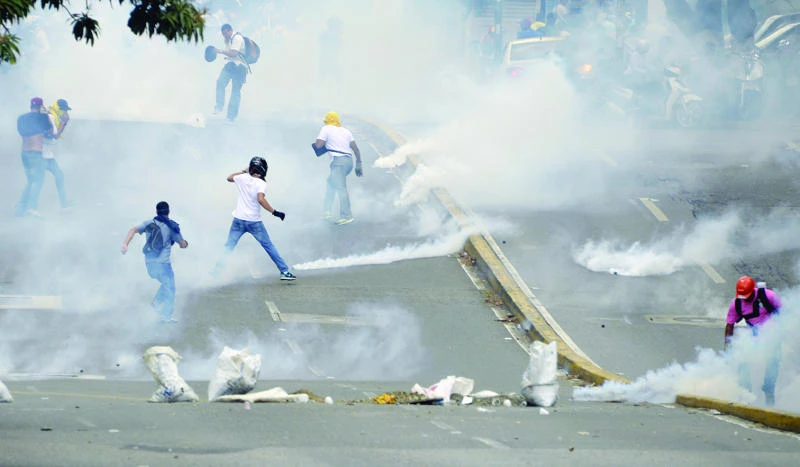 Venezuelan protests persist at start of holiday