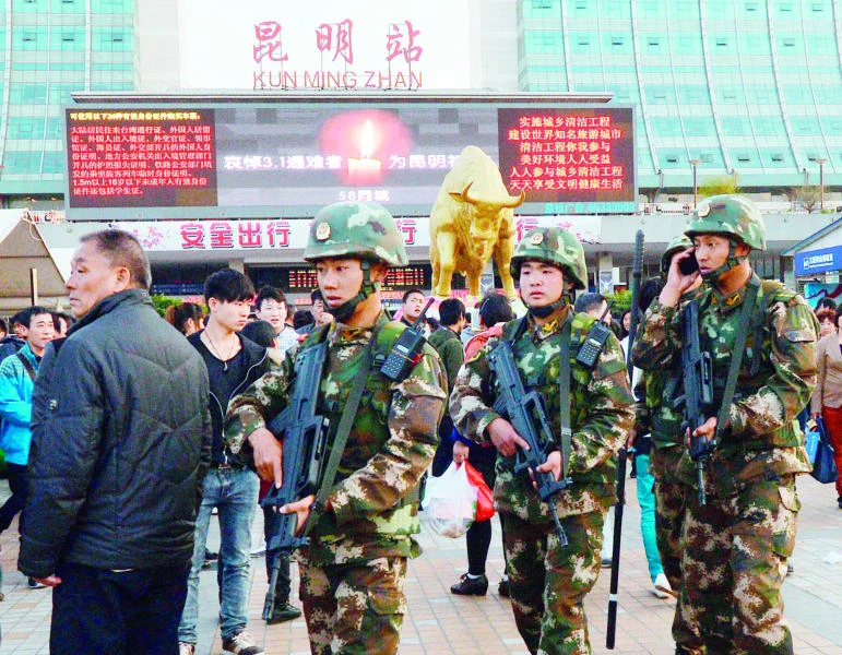 China nabs three more suspects in station attack