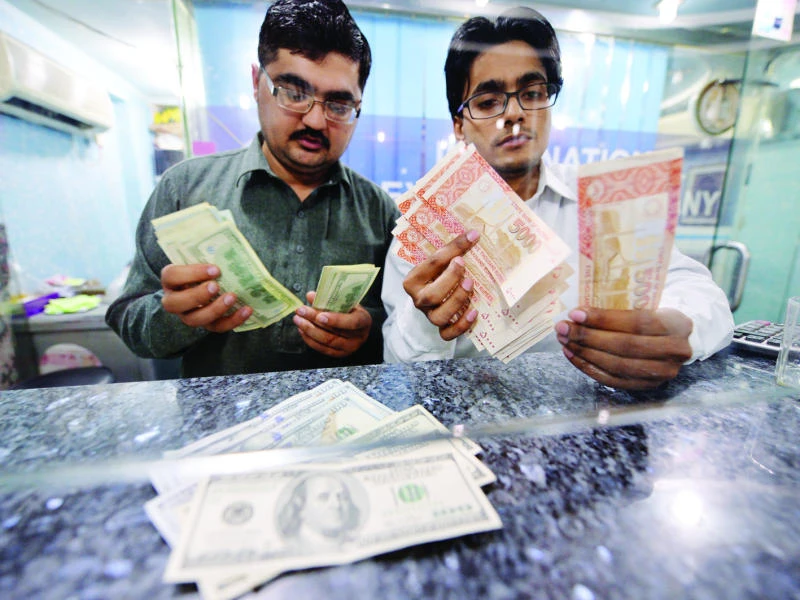 Karachi stocks end lower; rupee weakens