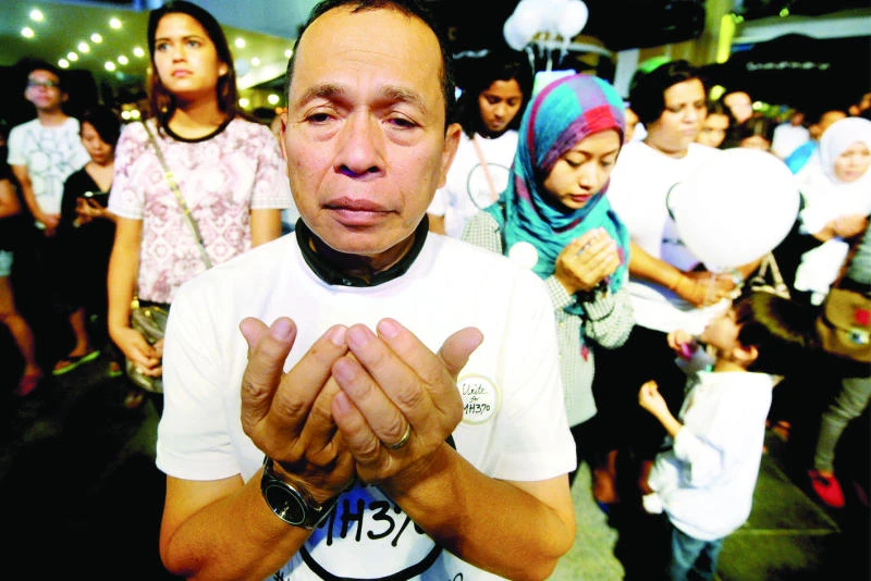 Ethnic Malaysia finds unity in shared sadness of missing plane