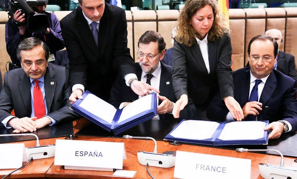 EU signs landmark political deal with Kiev