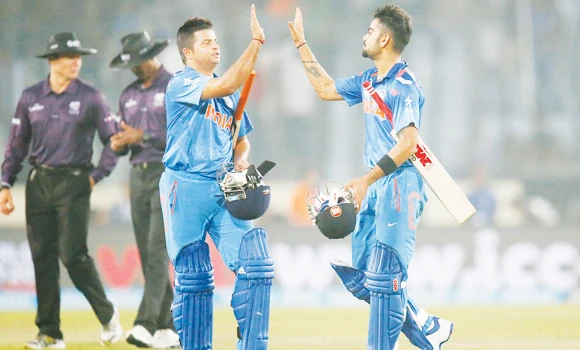 Kohli, Raina power India to easy win over Pakistan