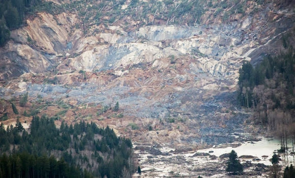 Massive mudslide kills three; traps many in US 3; in US