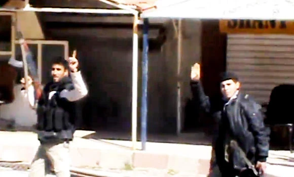 Assad cousin killed; rebels capture town near border
