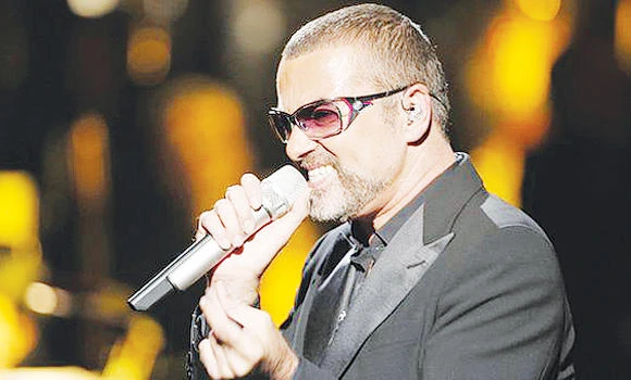 George Michael beats Kylie to top UK album chart
