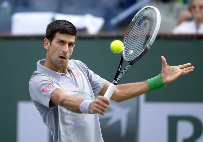 Djokovic books spot in 4th round