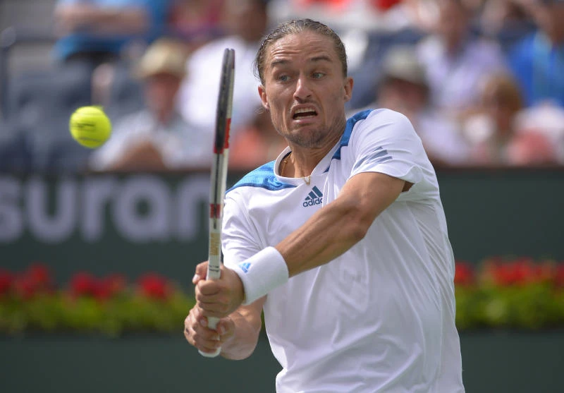 Federer books semis clash with Dolgopolov