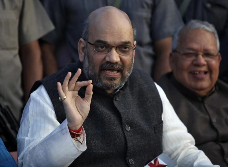 Murder charges dog close aide of Narendra Modi