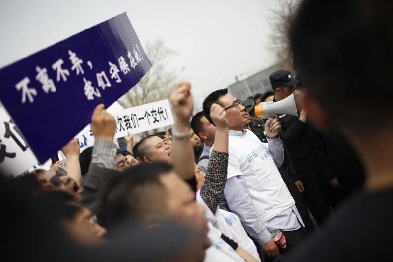 MH370 relatives stage Beijing march against Malaysia
