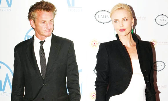 Theron, Penn to adopt?