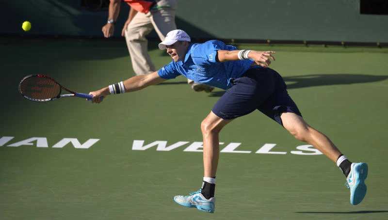 Djokovic books semifinal clash with Isner