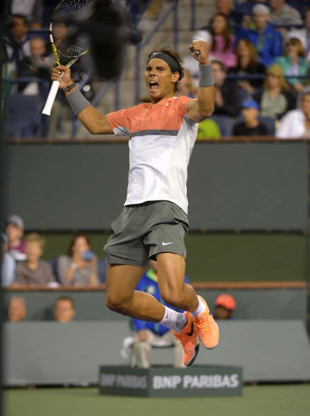 Nadal survives; Federer, Murray through