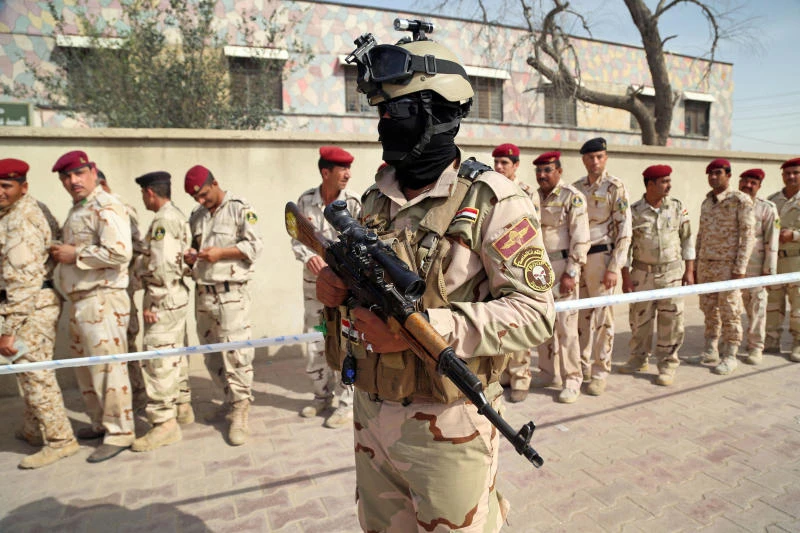 27 Iraq soldiers slain on their vote day