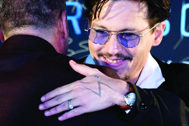 Engaged Johnny Depp shows off ‘chick’s ring’